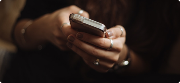 Woman using a dating app outdoors