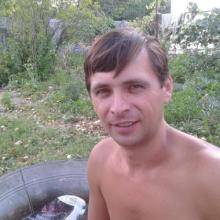 лев