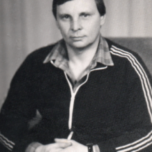 николай
