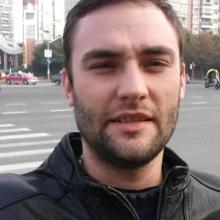 Николай