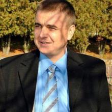Николай