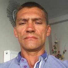 Николай