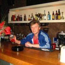 николай