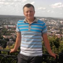 микола