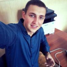 николай