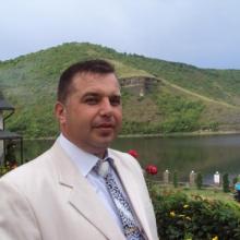 николай